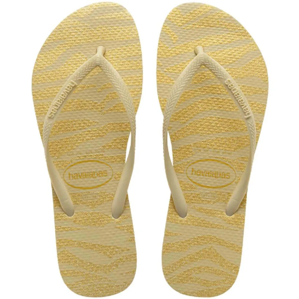 HAVAIANAS SLIM ANIM GLTR FC  (AREIA)