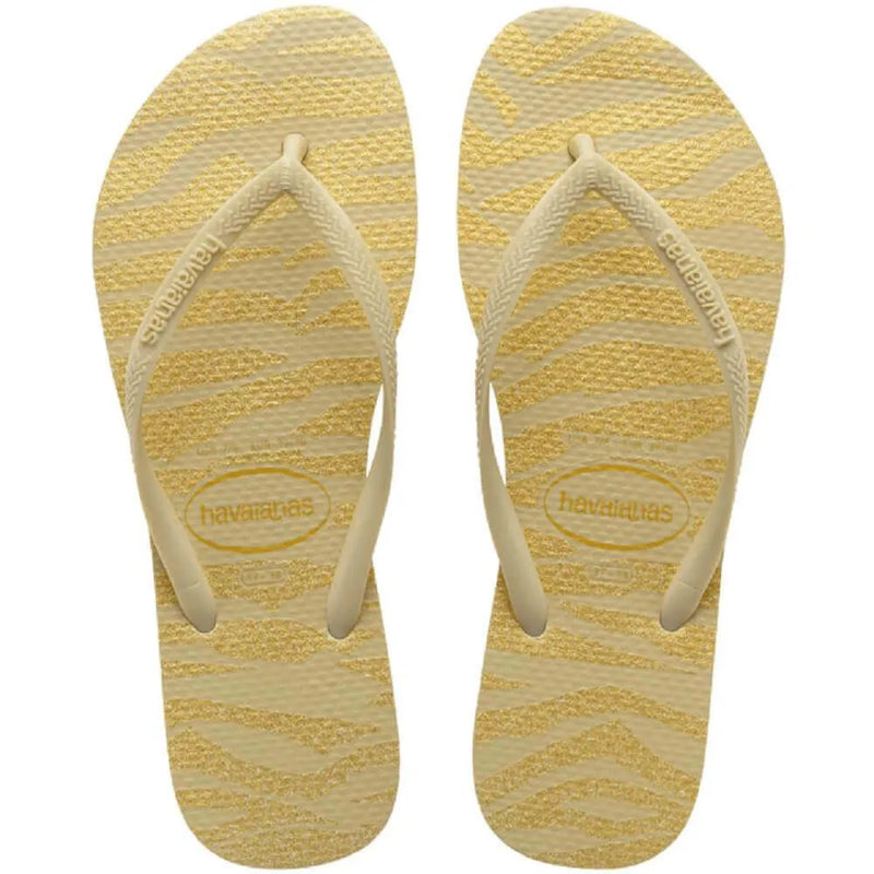 HAVAIANAS SLIM ANIM GLTR FC  (AREIA)